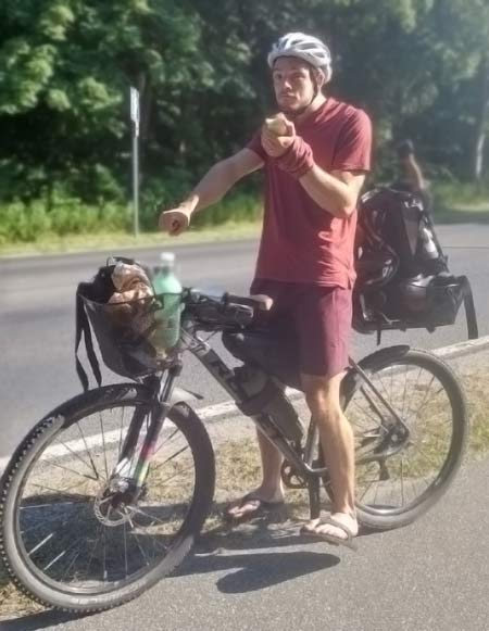 Bikepacking-with-backpack-in-basket